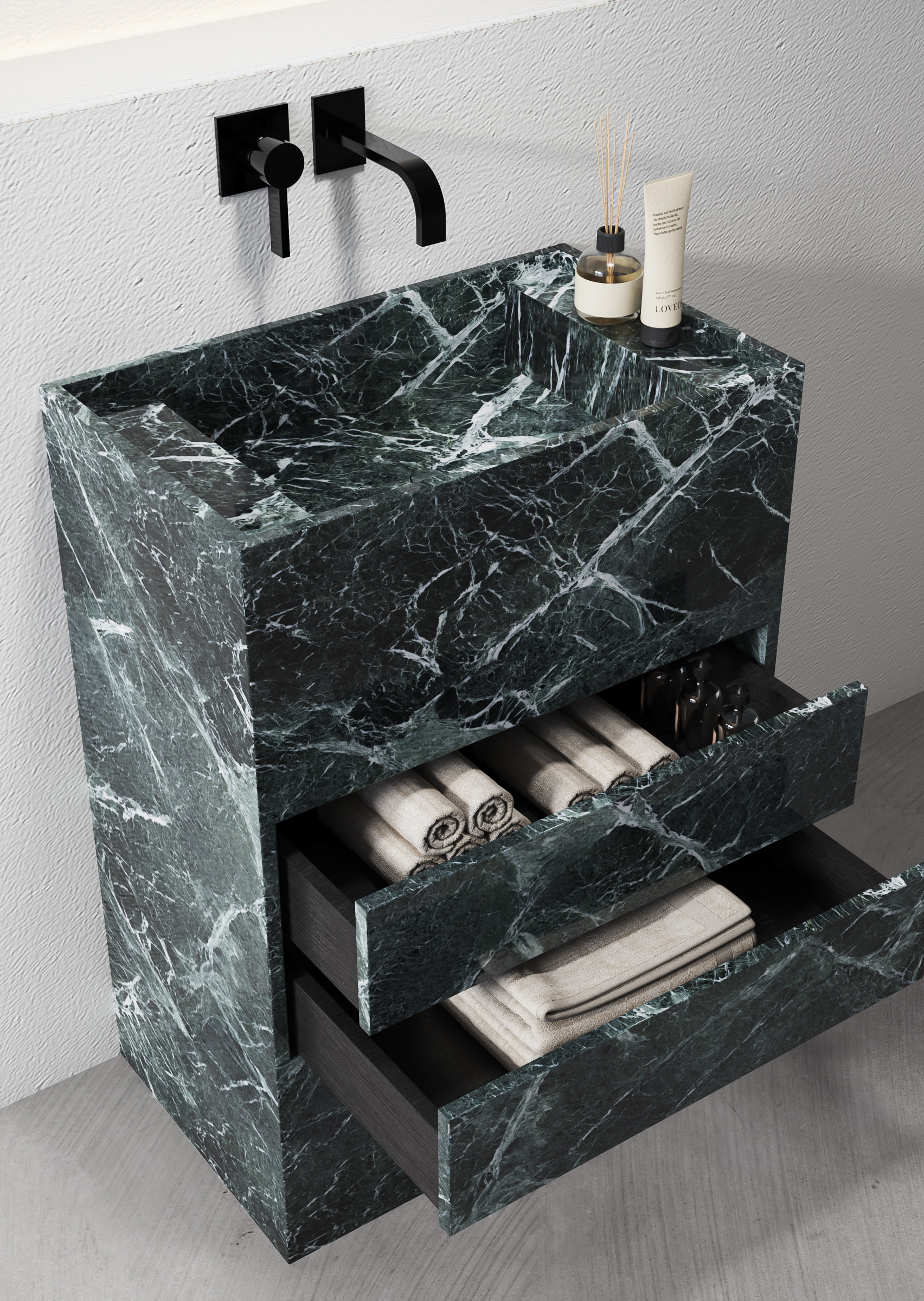 Verde Guatemala dark green marble vanity with integrated sink and open drawers showing internal storage