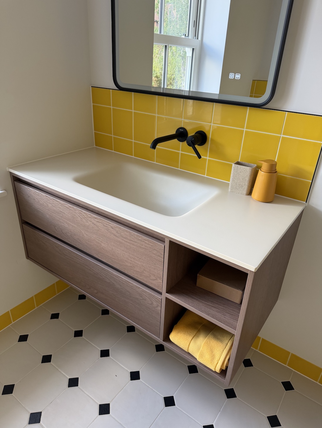 Lave 1200mm bespoke vanity with integrated sintered stone basin, installed in a South London bathroom