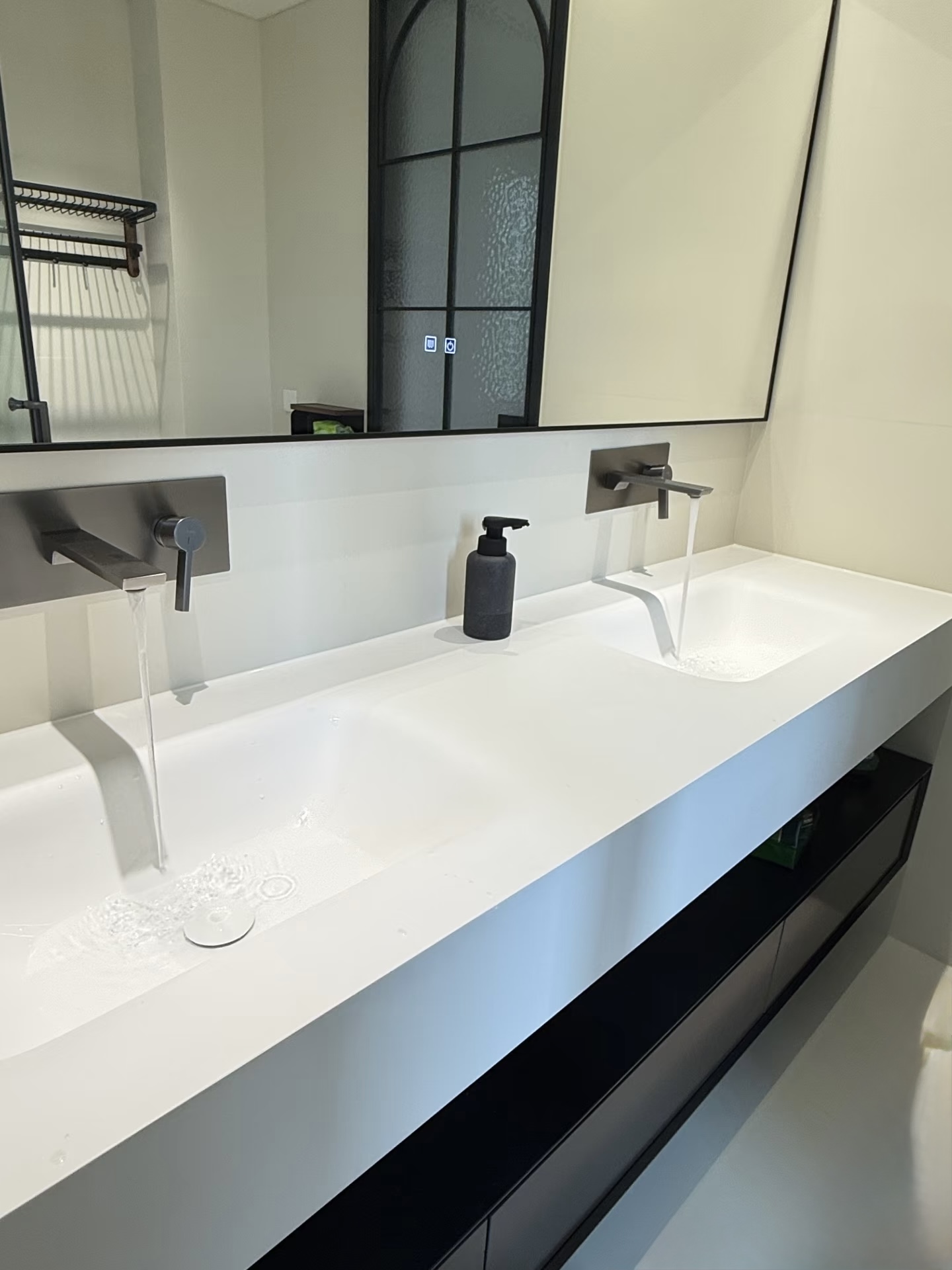 Lave 2400mm double basin bespoke vanity with twin integrated sintered stone bowls and 20mm counter drop, installed in London